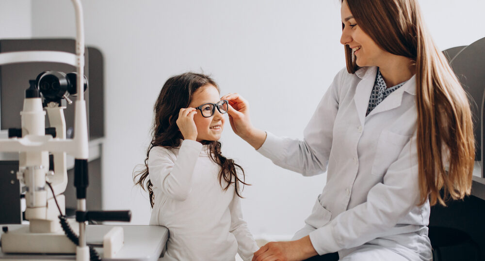 Little,Girl,Checking,Up,Her,Sight,At,Ophthalmology,Center