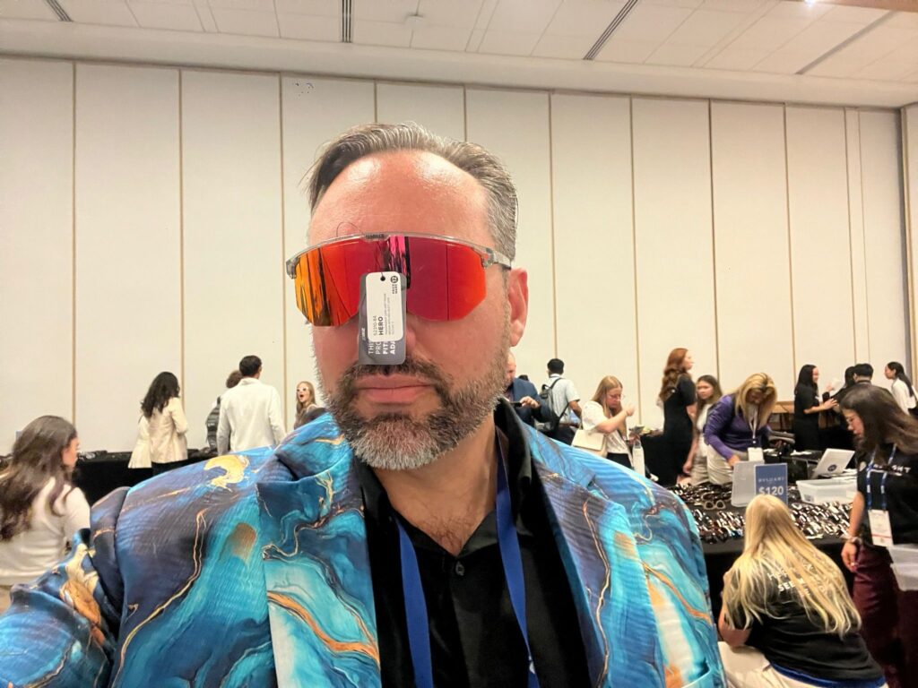 Matt Young trying on BVLGARI shades 